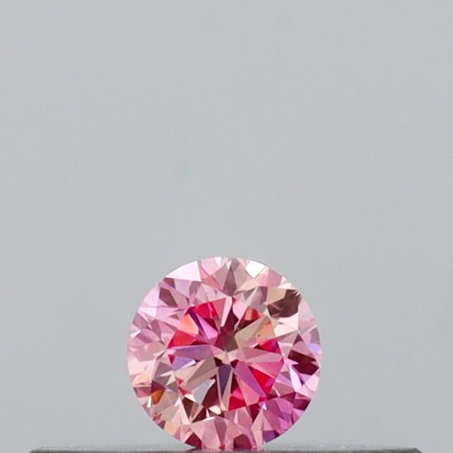 Actual 0.11 carat Vivid Pink Round lab-grown diamond