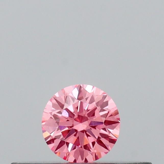 Actual 0.14 carat Vivid Pink Round lab-grown diamond