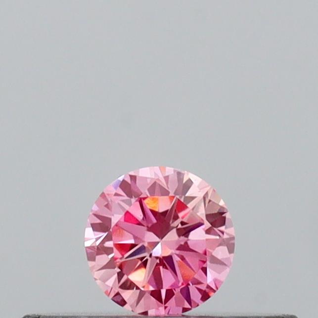 Actual 0.13 carat Vivid Pink Round lab-grown diamond