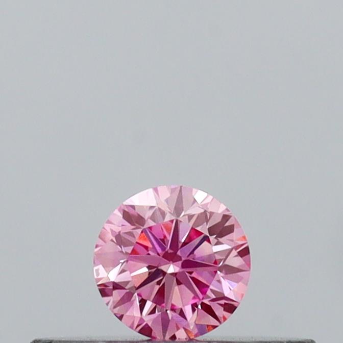 Actual 0.14 carat Vivid Pink Round lab-grown diamond