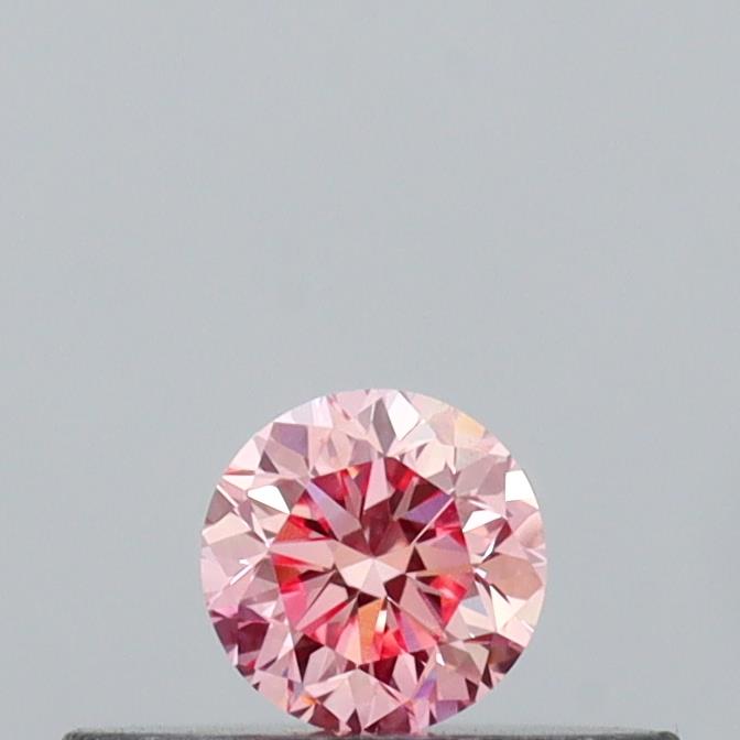 Actual 0.16 carat Vivid Pink Round lab-grown diamond