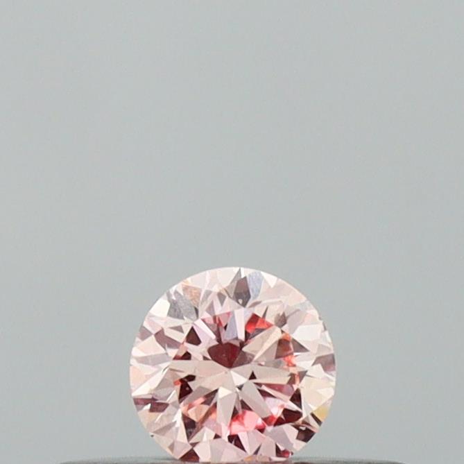 Actual 0.13 carat Intense Pink Round lab-grown diamond