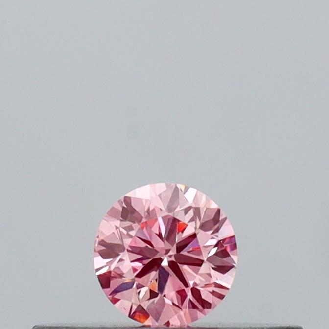 Actual 0.12 carat Vivid Pink Round lab-grown diamond