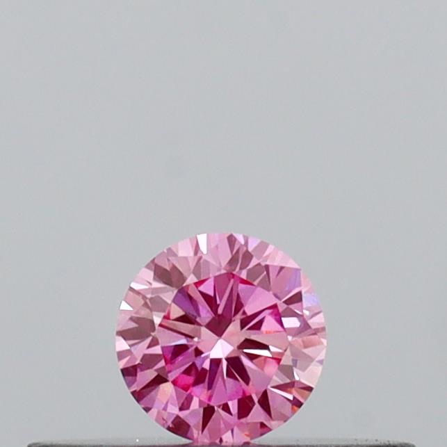 Actual 0.13 carat Vivid Pink Round lab-grown diamond