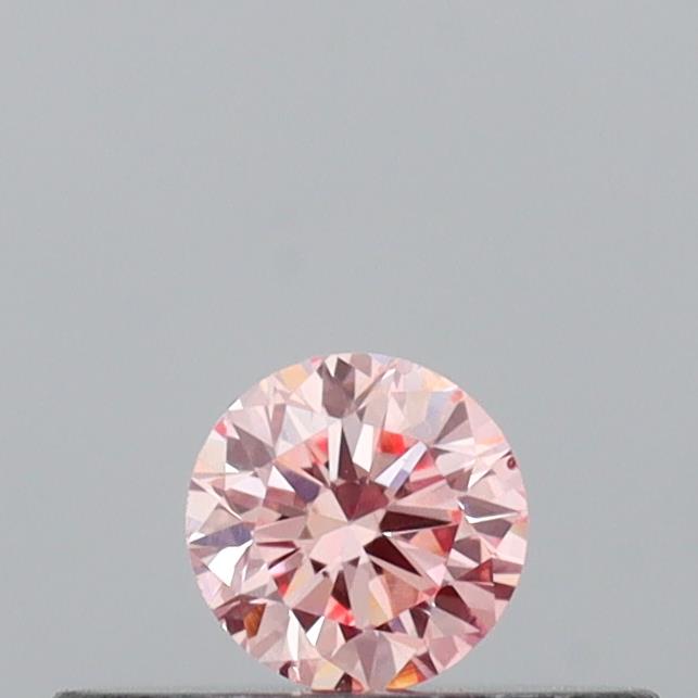 Actual 0.14 carat Intense Pink Round lab-grown diamond