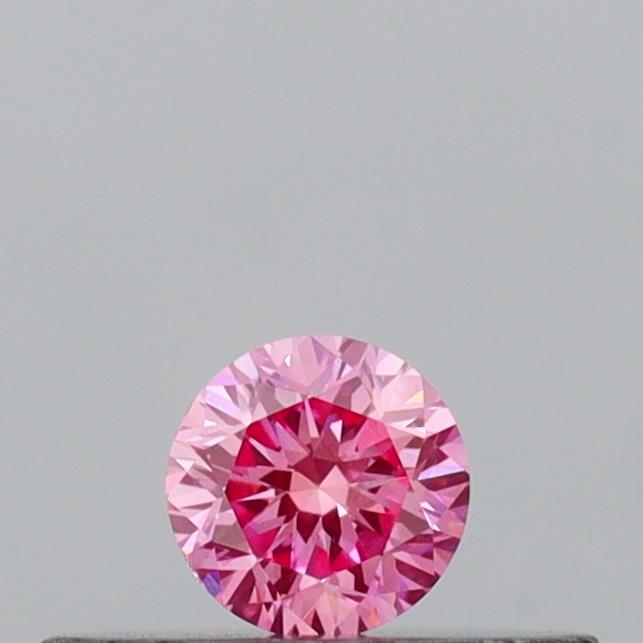 Actual 0.14 carat Vivid Pink Round lab-grown diamond
