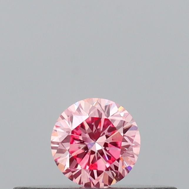 Actual 0.14 carat Intense Pink Round lab-grown diamond