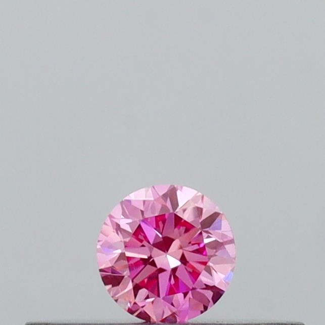 Actual 0.11 carat Vivid Pink Round lab-grown diamond