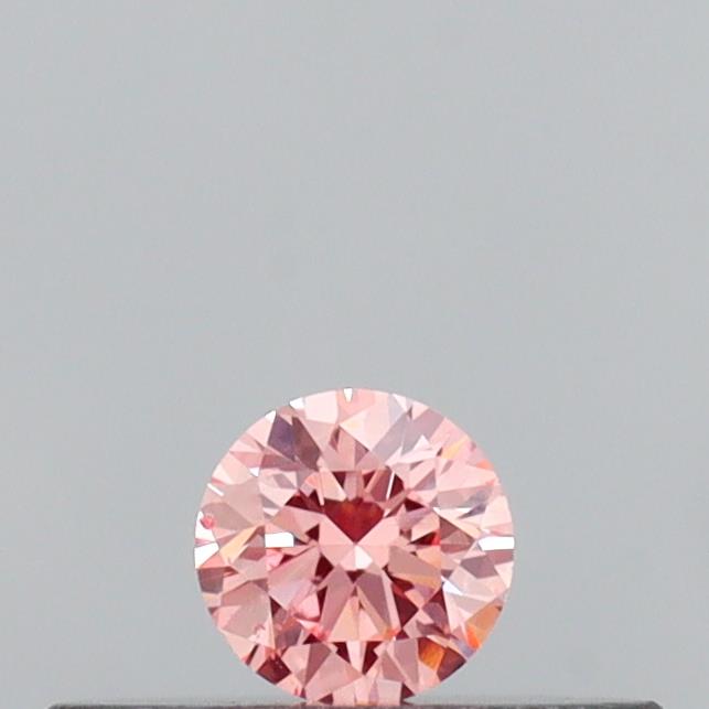 Actual 0.11 carat Intense Pink Round lab-grown diamond