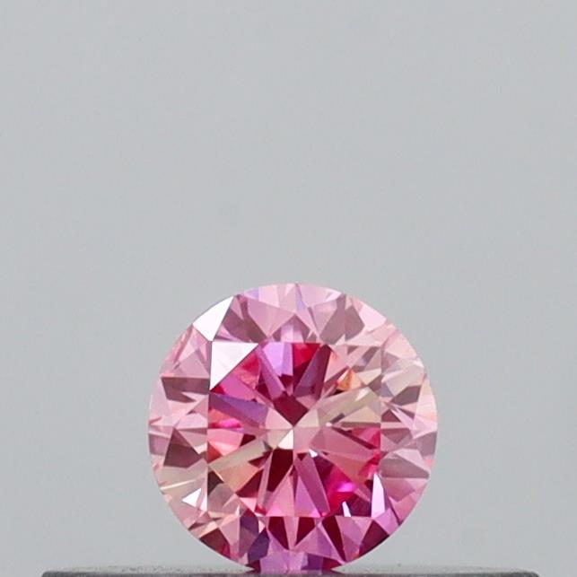 Actual 0.16 carat Vivid Pink Round lab-grown diamond