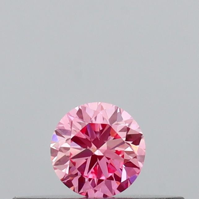 Actual 0.14 carat Vivid Pink Round lab-grown diamond