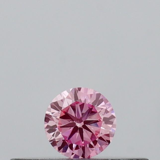 Actual 0.12 carat Vivid Pink Round lab-grown diamond