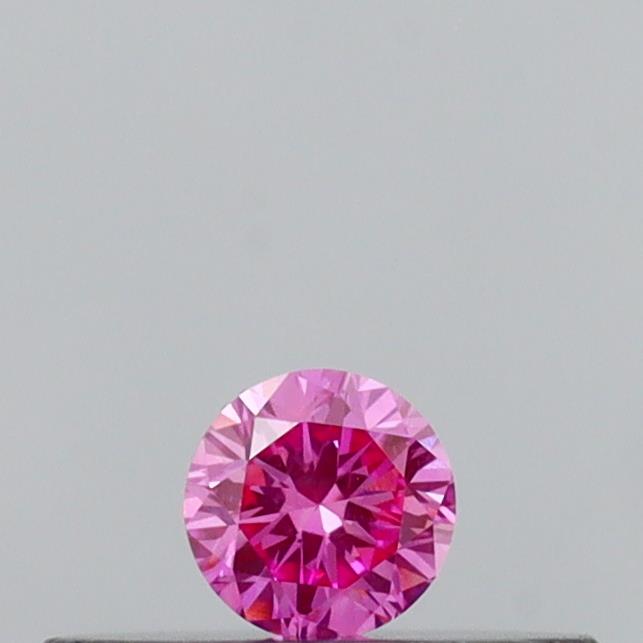 Actual 0.09 carat Vivid Pink Round lab-grown diamond