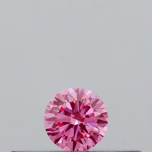 Actual 0.09 carat Vivid Pink Round lab-grown diamond